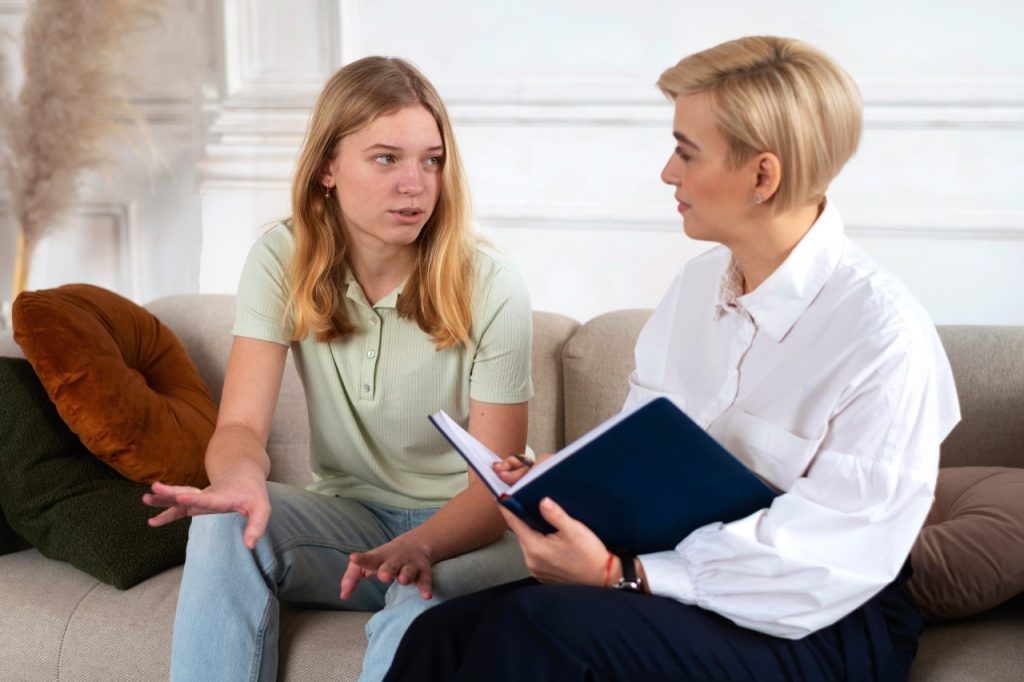 Professional therapist providing adolescent depression help Sugar Land during a private youth counseling session.