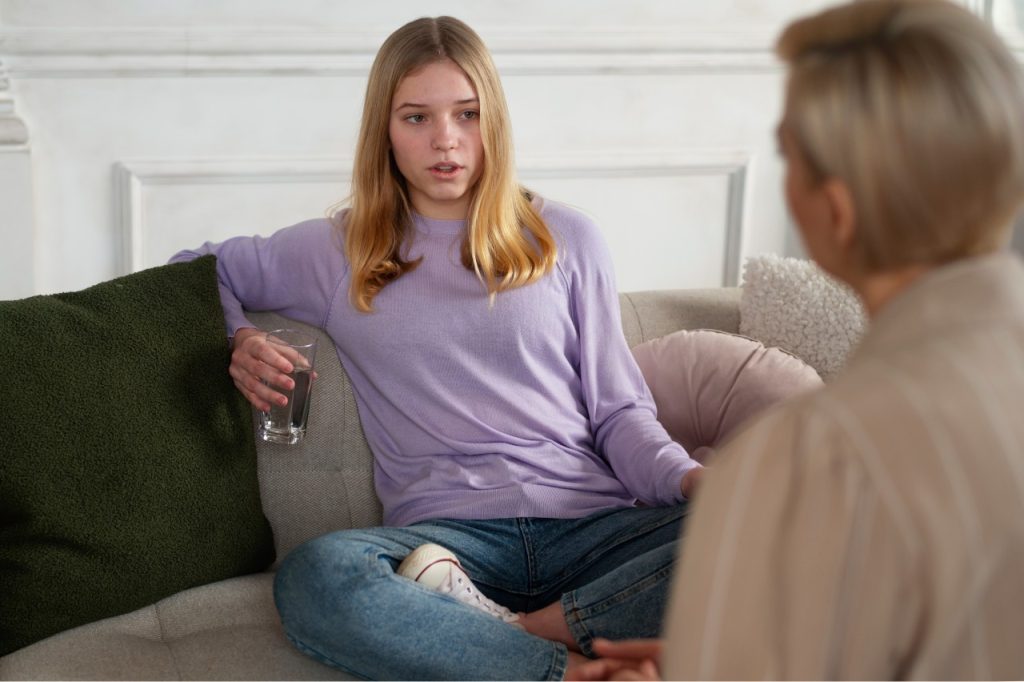Professional Adolescent Depression Help Sugar Land therapist offering compassionate support to a young teen girl.